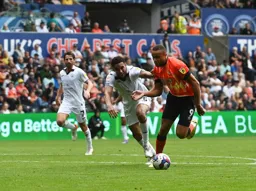 Carlton Morris races away from Ben Cabango