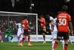 Carlton Morris`s header is on his way to the net for the Town`s goal