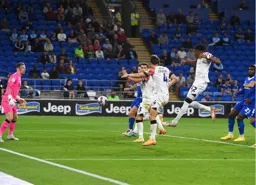 On its way. Gabriel Osho`s effort heads towards the goal for the Town`s second goal