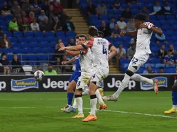 Gabriel Osho leaps in to score the Town`s second goal