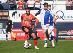 Jordan Clark uses the outside of his boot to move away from Ryan Morton