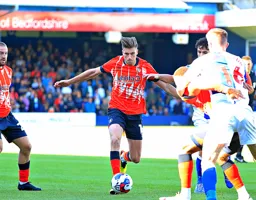 Reece Burke starts on the run that led to him scoring the second goal