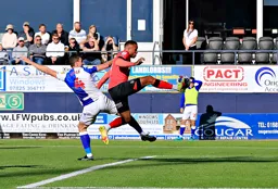 Carlton Morris brings the ball under control before scoring the first goal