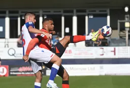 Carlton Morris leans into Dom Hyam