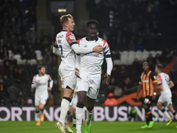 James Bree and Elijah Adebayo look pleased after the Town go 1-0 in front