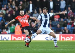 Allan Campbell gets his foot on the ball