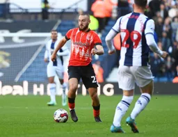 Allan Campbell plays the ball with outside of his foot