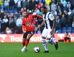Henri Lansbury closes down Matt Phillips
