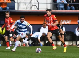 Harry Cornick brings the ball forward