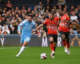 Jordan Clark surges forward in search of a late winner