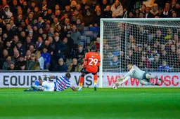 Ehan Horvath gets down low to save Yakou Maite`s effort on goal