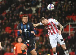 Carlton Morris and Ben Willmot take their eyes off the ball