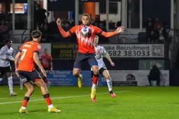 Carlton Morris chest controls the ball