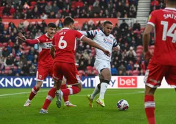 Dael Fry moves in to tackle Carlton Morris