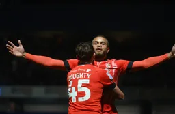 Carlton Morris celebrates the first goal with Alfie Doughty