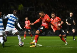 Carlton Morris scores his and the Town`s first goal of the evening