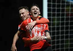Alfie Doughty celebrates his goal with Cauley Woodrow