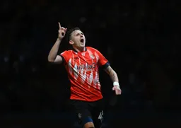 Alfie Doughty has just scored with a wonder strike for the Town`s third goal