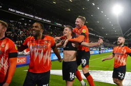 Lets celebrate. And they do after Reece Burke`s late winner for the Town