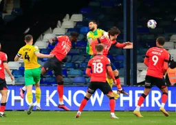 Elijah Adebayo heads in the Town`s second goal