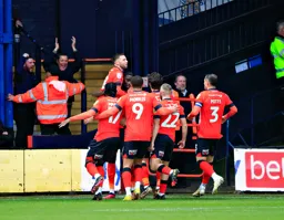 Elijah Adebayo takes the congratulations after scoring the second goal