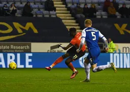Elijah Adebayo scores the Town`s last minute winner