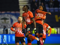 Elijah Adebayo celebrates his winning goal with Gabriel Osho