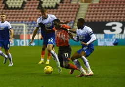 Elijah Adebayo is tripped by Tendayi Darikwa