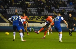 Elijah Adebayo takes a shot at goal