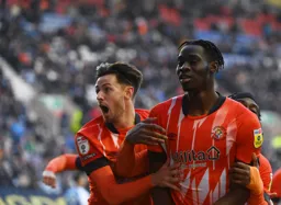 Harry Cornick and Elijah Adebayo celebrate Adebayo`s goal