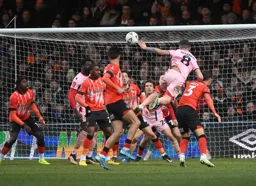Gavan Holohan gets above Dan Potts to head in Grimsby`s first goal