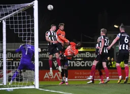 Luke Berry and Elijah Adebayo attack the Grimsby goal but to no avail