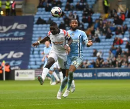 Marvelous Nakamba heads the ball forward