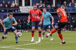 Elijah Adebayo moves the ball forward