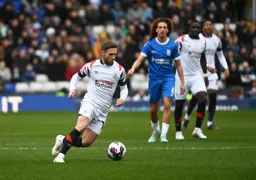 Jordan Clark moves forward with the ball