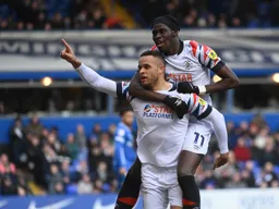 Carlton Morris and Elijah Adebayo celebrate Morris`s goal