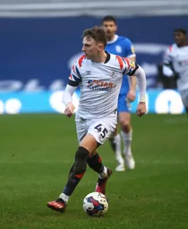 Alfie Doughty takes his eyes off the ball