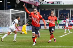 Carlton Morris signals one for us after scoring the games only goal