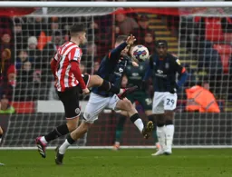 Luke Berry attempts to block James McAtee