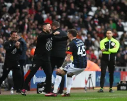 Alfie Doughty celebrates on the sideline