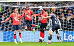 Gabriel Osho heads the ball clear