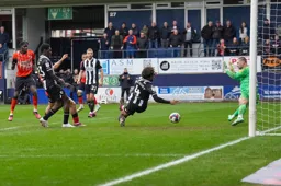 Allan Campbell hidden behind Ismalla Sarr scores the Town`s second goal