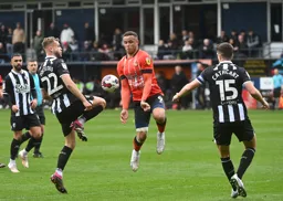 Carlton Morris faces up to Ryan Porteous