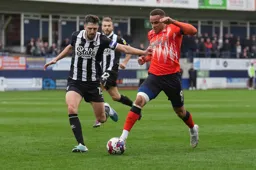 Carlton Morris is closed down by Craig Cathcart