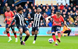 Alfie Doughty takes a shot at goal