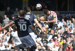 Carlton Morris manages to get his head to the ball