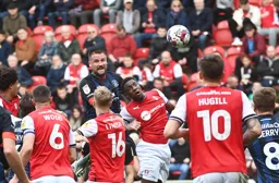 Sonny Bradley gets his head to the ball