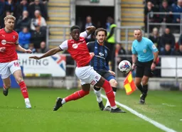Tom Lockyer plays the ball down the touchline