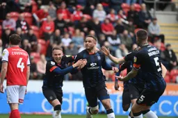 Carlton Morris has just scored the Town`s first goal much to the delight of Cauley Woodrow