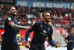 Carlton Morris scorer of the first goal with Sonny Bradley looking pleased about it